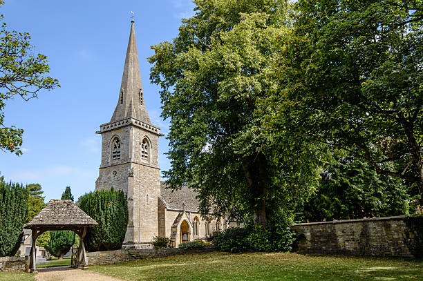 Church in the Cotswolds Church in Lower Slaughter, Cotswolds, a blue sky day marys stock pictures, royalty-free photos & images