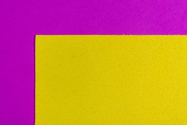 istock Eva foam lemon yellow on smooth pink 607476380