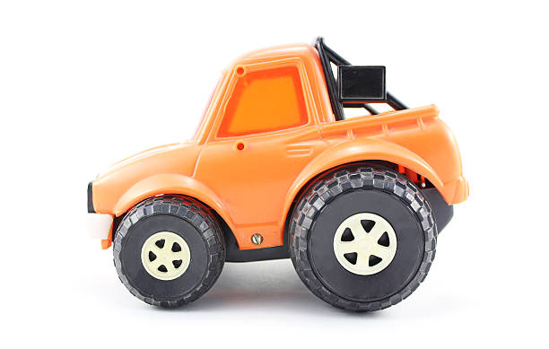 istock Old worn toy car on a white background 607476436