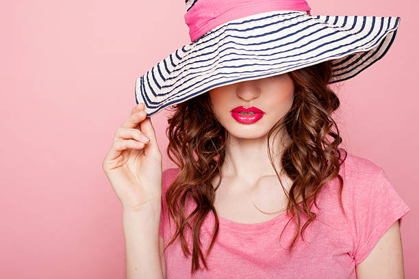 istock beautiful girl in hat with a brim 607477004