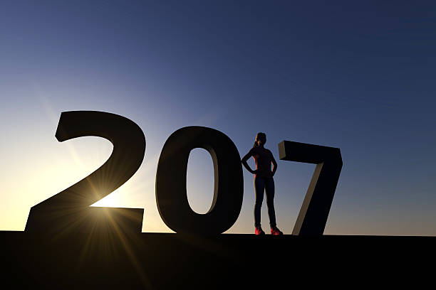 silhouette 2017 avec figure féminine - 2017 photos et images de collection