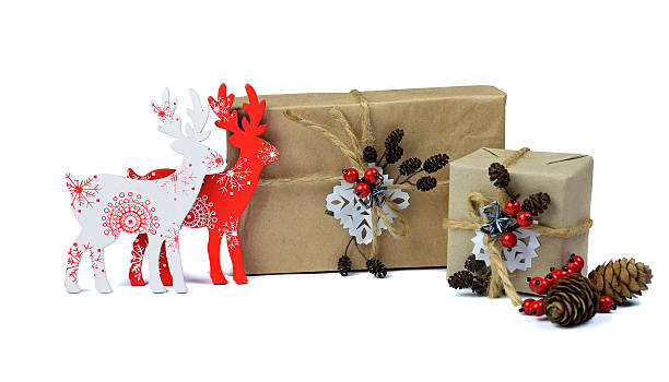 istock Christmas handmade gifts. Wooden deer. Rustic style. / Isolated /. 607484086