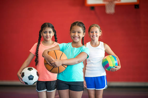 istock Elementary Girls Playing Sports 607485770