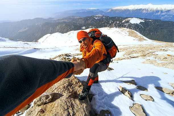 istock Winter hiking in the mountains with a backpack. 607486318