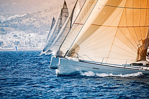 barca a vela  - sailing sailboat regatta teamwork foto e immagini stock