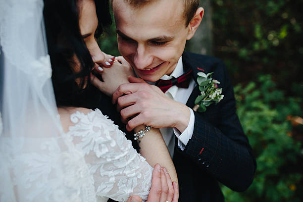 istock Bridal couple close to each other 607488842