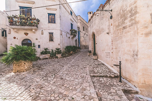 istock typical old street view of Matera under blue sky 607490512