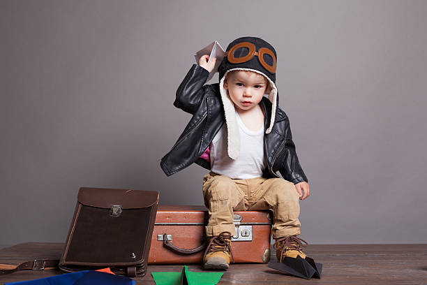 istock little boy pilot plays paper airplanes 607491226