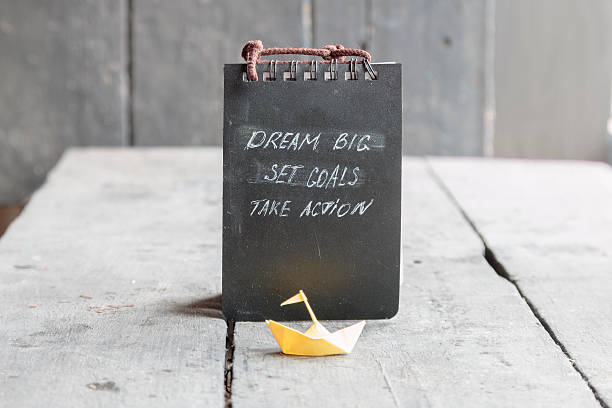 Dream Big - Set Goal - Take Action, motivational quote stock photo