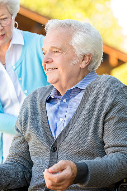 istock Thoughtful senior man outside his home 607494412