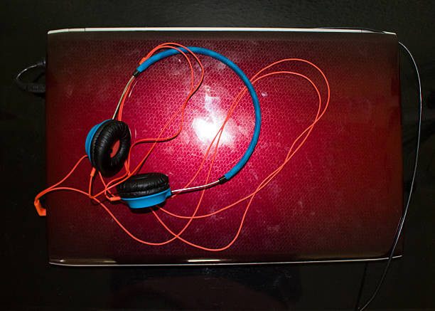 istock Headphones with laptop. 607496050