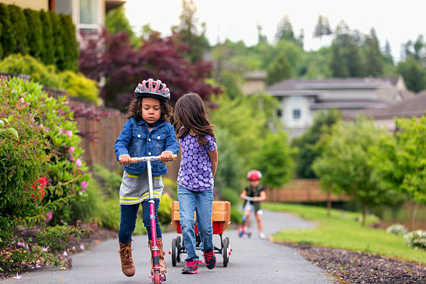 istock Young diverse neighborhood kids playing 607498524