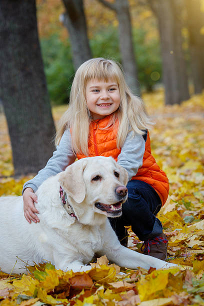 istock Girl and her dog 607499112