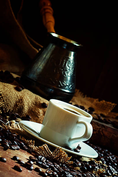 istock White cup of black coffee with foam 607499380