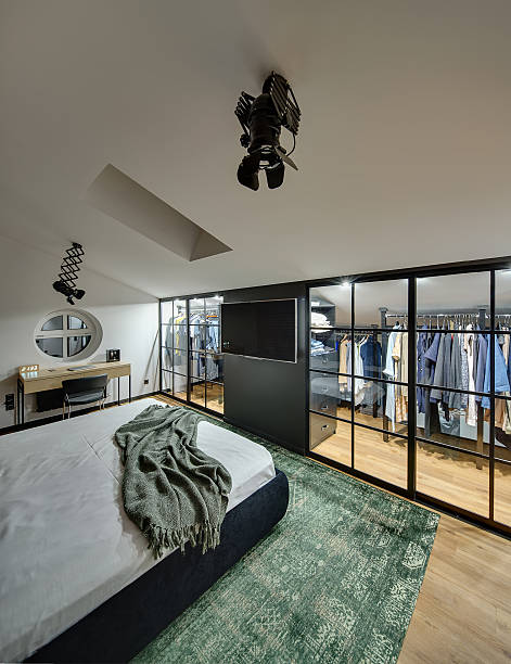 istock Glowing bedroom in modern style 607500166