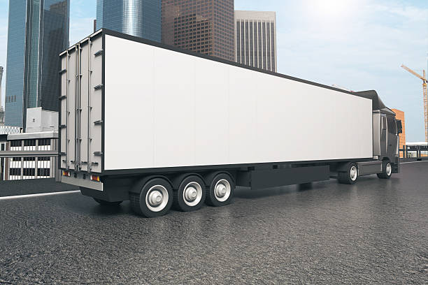 istock White truck on city background 607501690