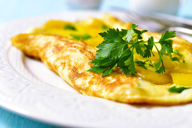 istock Omelet stuffed with potato and cheese. 607501994