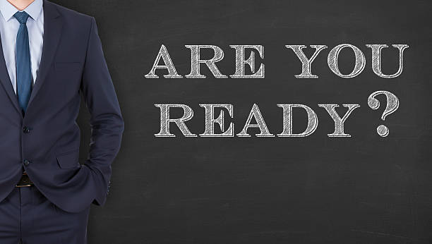 istock Business Man Writing  Are You Ready on Chalkboard 607502112