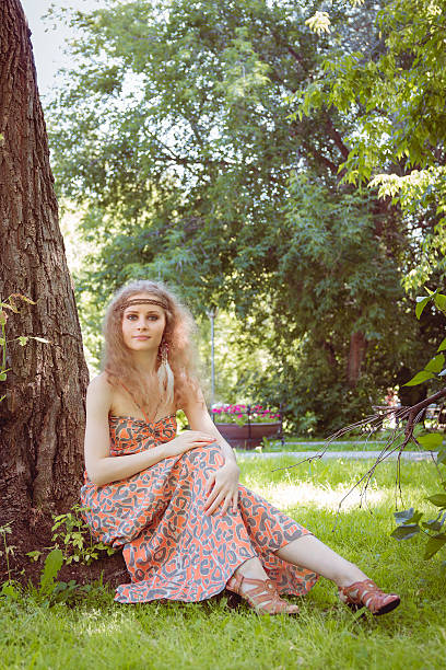 istock Beautiful Boho Girl Sitting 607504276
