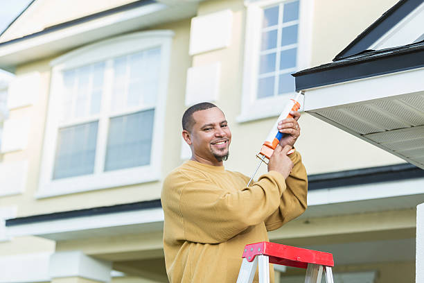 istock Young handyman doing house repairs 607504824