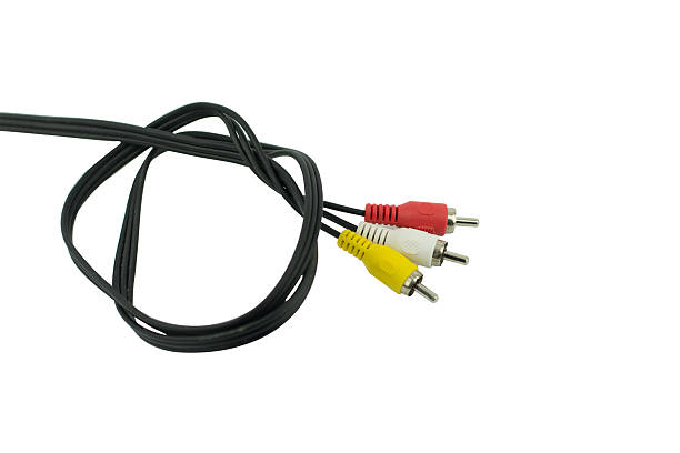 istock Audio video cable RCA to 3.5mm jack isolated on white 607504906