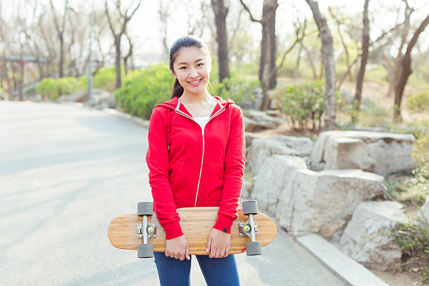 istock girl and her skateboard 607506524
