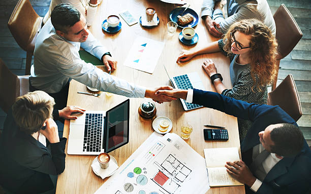 istock Business People Meeting Discussion Corporate Handshake Concept 607507098