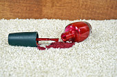 spilled red nail polish on carpet