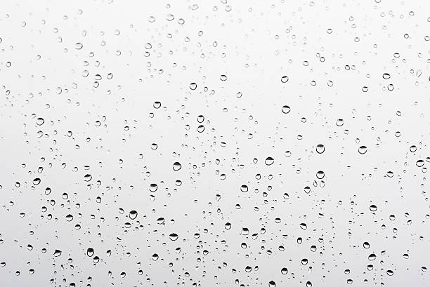 istock Drops of rain on the window 607508512