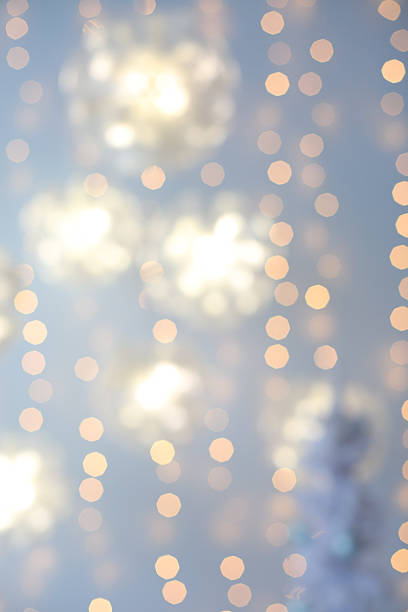 istock Christmas tree with blue and white toys in the interior 607585890