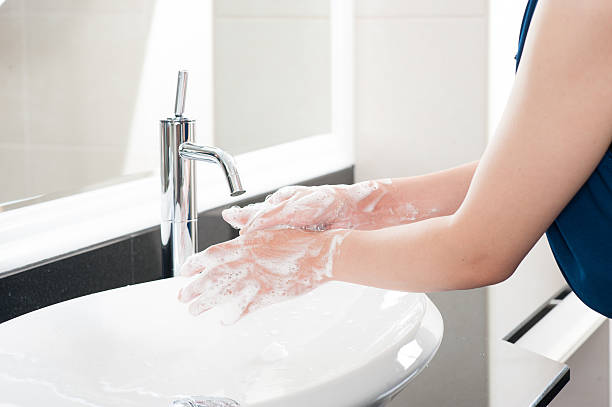 istock Washing women's hand 607588898