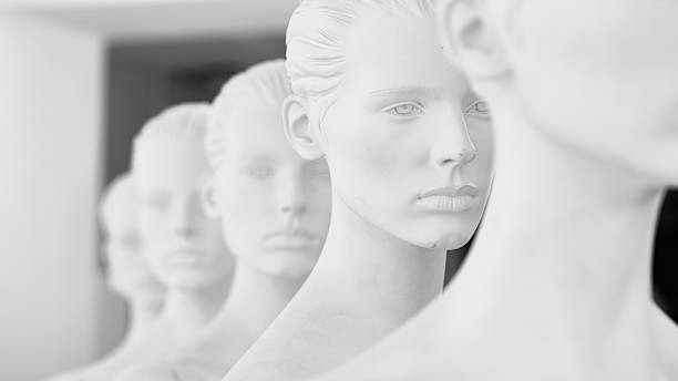 Row of dummies Scuffed mannequins in row mannequin photos stock pictures, royalty-free photos & images