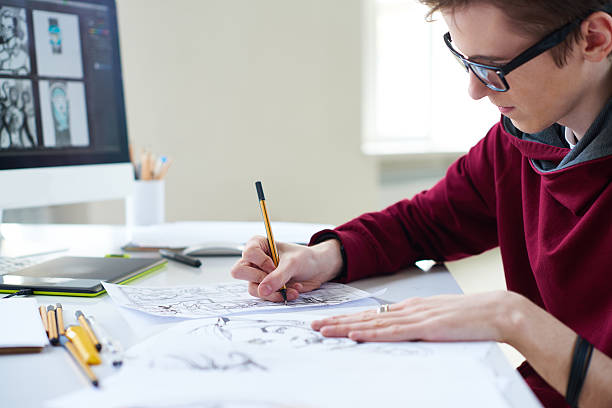Designer Drawing Comics 900+ Comic Book Drawing Photos Stock Photos, Pictures & Royalty-Free ...