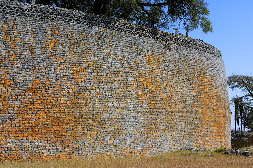 Great Zimbabwe is the ruined ancient capital of the Kingdom of Zimbabwe in the south-eastern hills of the country. The walls of the Great Enclosure reach 11 meters high. Great Zimbabwe was built between the 11th and 15th century and gave its name to the country after gaining independence from the UK in 1980.