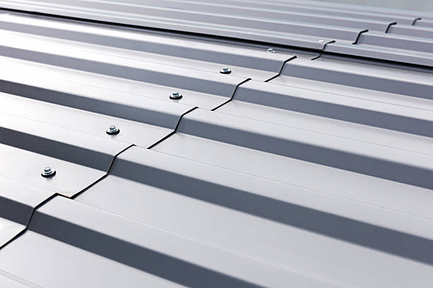 istock corrugated metal cladding on industrial building roof 607592258