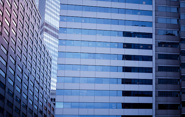 istock windows of business building 607592826