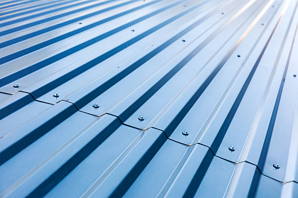 blue corrugated metal roof with rivets - construction built structure metal material imagens e fotografias de stock