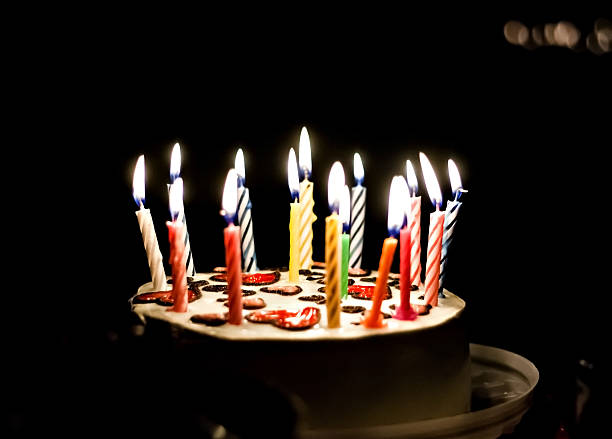 istock cake with hearts and candles 607593618