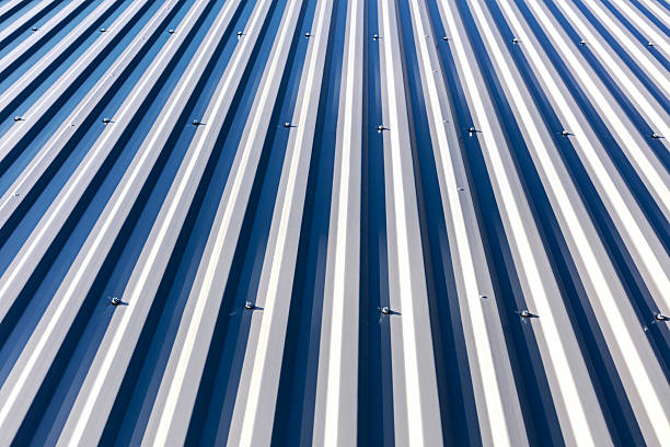 istock galvanized metal steel roof under direct sunlight 607593980