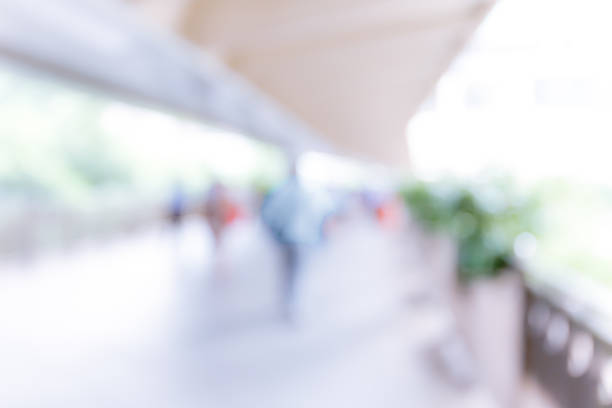 istock Abstract background of people on footbridge 607594426