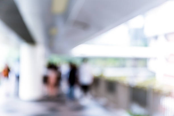 istock Abstract background of people on footbridge 607594596
