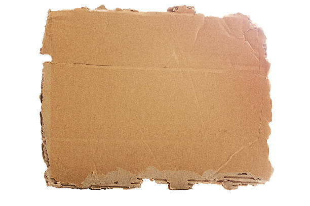 istock Brown corrugated cardboard torn and isolated on white. 607595016