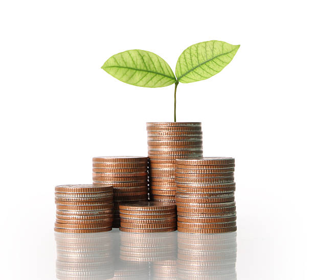 istock Coins graph stock market 607598164