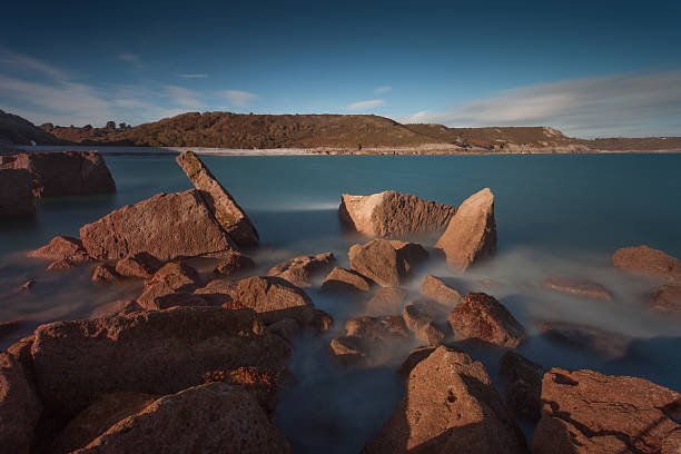 istock Pwll Du Bay rocks 607598330