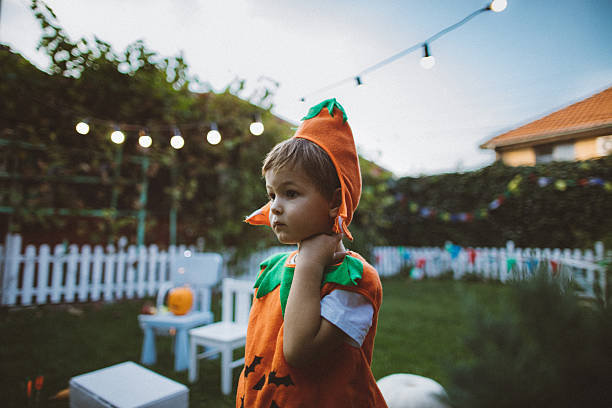 istock Scary pumpkin in the backyard 607598340
