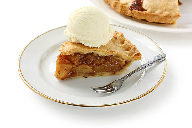 istock homemade apple pie with ice cream 607602326