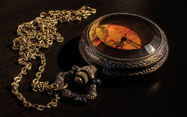 istock old pocket watch with glass top cover 607602354