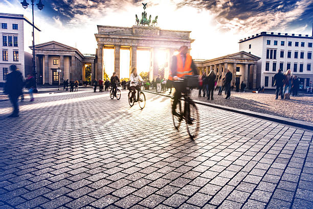 istock Berlin - cycling at Brandenburg Gate 607602672