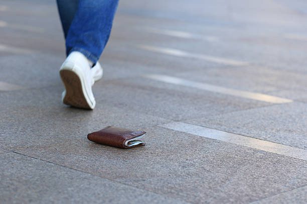 istock people lost leather wallet with money 607603564