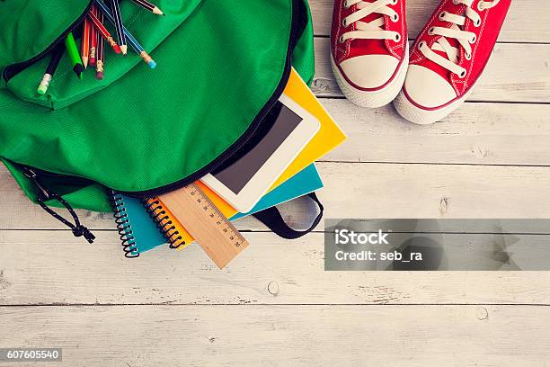 School Backpack On Wooden Background Stock Photo - Download Image Now - Back to School, Backpack, Satchel - Bag